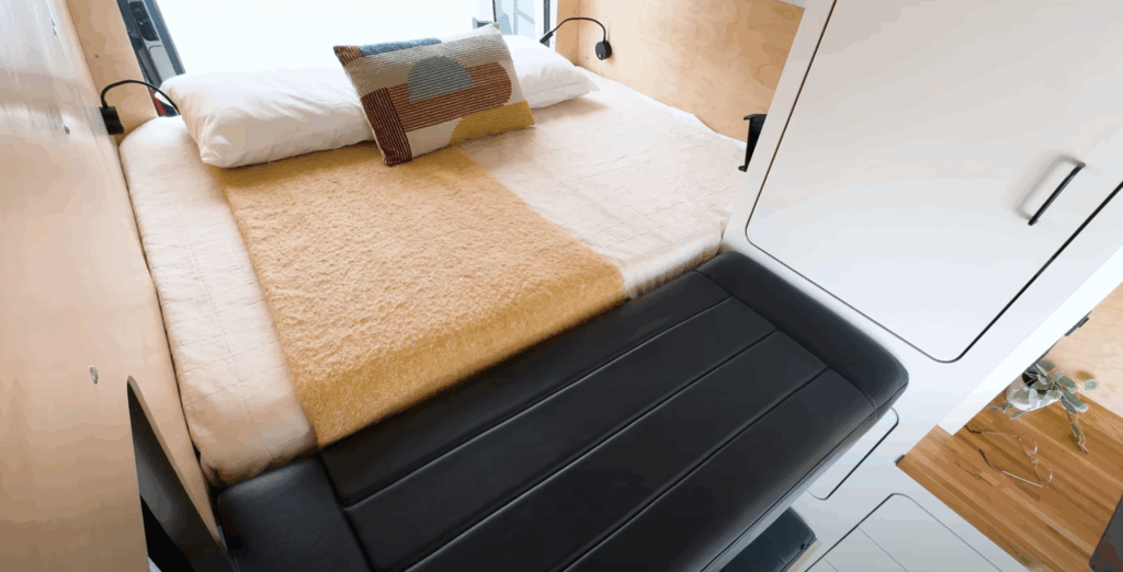 VanCraft's exclusive bed extension gives you more than 6 feet of sleeping space
